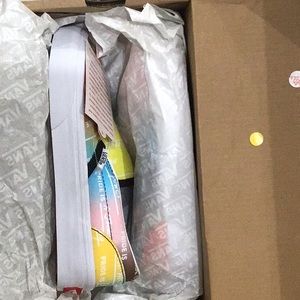 Vans classic slip ons pride edition
